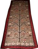 Lot#1322, NAVAJO PICTORIAL WOOL RUG, 12' 0" X 5' 0"Gray field with central corn maiden, birds and arrow motifs overall, fret style border.