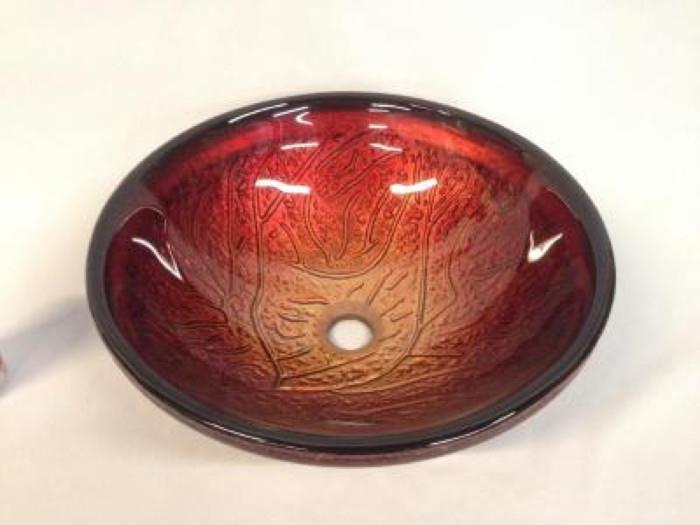 Bathroom Sink: This is a beautiful round bathroom sink that has no manufacturer label on it. It is red glass and has never been used. This belonged to a builder who ended up not using it. It is a work of art that would enhance any bathroom. It measures: 6.50"H x 16.50"Dia. 