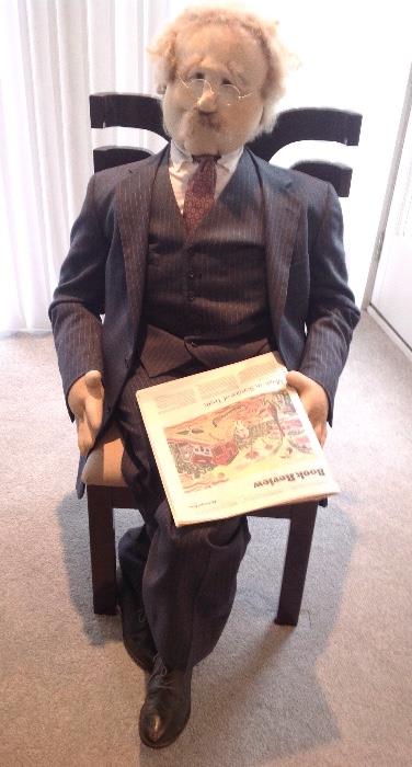 Life Size and Life Like Soft Sculpture of Man Reading the New York Times Book Review
