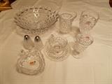 Sampling of American Fostoria Crystal...front row Finger Bowl (paper label); second row...pair of salt/pepper shakers...cup & saucer (paper label on many of them (8 sets of those)...parfait glass (4 od those); third row...3 toed round bowl...iced tea glass (8 of those)...water glasses (8 of those)...