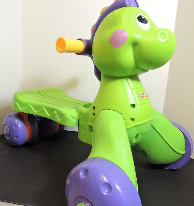 Toys-Fisher price riding dinosaur/dragon.