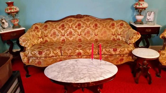1950's sofa, lyre base marble top tables, gone with the wind lamps