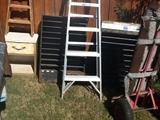 Aluminum Ladders and misc. tools, cabinets, wheelbarrow and more