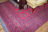 Close-up of the oriental rug in the bedroom with the Victorian bed. The rug measures 8'2" by 11' 2 1/2" long. It is an antique rug in excellent condition.