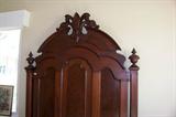 This photo shows the headboard on the Victorian bed.