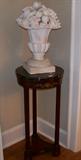 French Empire fern stand with a faux concrete basket of fruit.