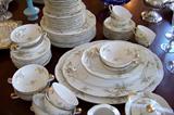 "Rosalinde" china by Haviland - service for 8 including dinner plates, salad plates, bread & butter plates, teacups and saucers, cream soups w/underplates, two platters, oval vegetable bowl.
