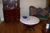 Wonderful small Victorian sofa and marble top coffee table.