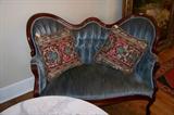Closer look at the small Victorian sofa.