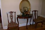 Beautiful marble top console table and pair of Chippendale side chairs -in the foyer.