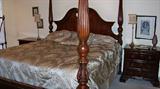 Beautiful 4 post mahogany king size bed -in the master bedroom.