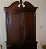 Mahogany armoire in the master bedroom.