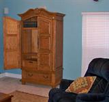 Very nice entertainment center - this would be great in a bedroom from clothing, etc. as well as for TV's in a den