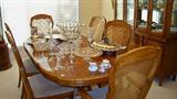 View of the dining room table and chairs.