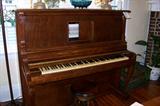 Player Piano - plays beautifully - with numerous piano rolls - owner has indicated that she will pay to have the piano moved out of the house.