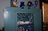 Nice painted china cabinet. Located in the room off of the dining room.