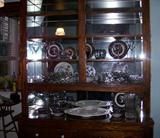 Wonderful built in cabinet featuring crystal goblets, Mulberry china, platters, crystal dishes.