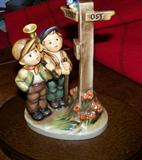 This is one of three Hummel figures - all in original boxes. These are commorative, limited edition figures all signed on the bottom by the artist. This one is called "Crossroads" and is a commemorative piece honoring the Berlin Airlift. Also including with this is a replica of the Berlin Wall. I have two of this particular figure.