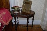 1930's table w/William and Mary style legs.On top of the table is a beautiful brass ornate framed mirror/picture frame.