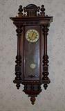 Beautiful English Victorian clock - hanging in the Victorian bedroom.