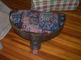 European footstool with tapestry covering.