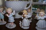 Just a few of the many bisque angel figurines - all collectible.