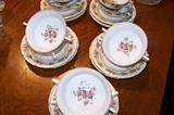 This is a set of 10 cream soups with underplates in the "Hostess" pattern. The cream soups are sold as a set of 10, separate from the set of china.