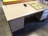 Sturdy Executive desk with a lot of storage.  Each corner consists of "Hide-away" for your wires.  Can be completely disassembled for easy travel.