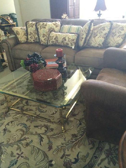 Leather sofa & chair, rug, and glass top coffee table