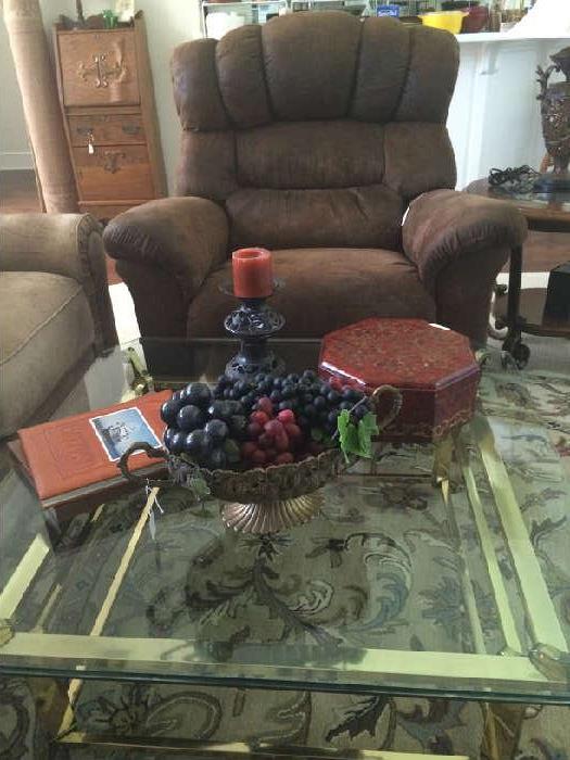    Leather chair, glass top coffee table, accessories