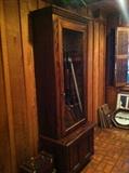 Nice solid dark stained wood gun cabinet (The guns are NOT part of this sale and are no longer at the sight)