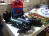 Some vintage cast iron toys and other vintage toys and games.