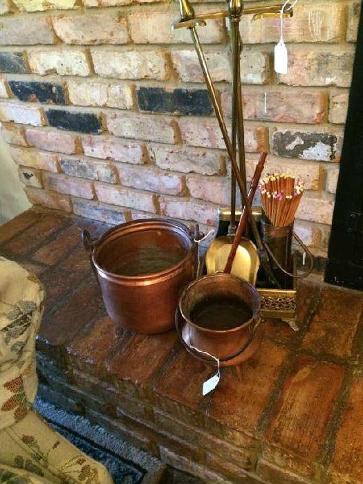                Copper pots; brass fire tools 