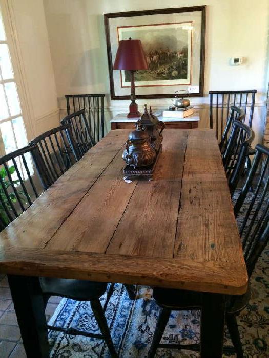       Exceptional farm table with 8 black chairs