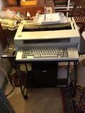          IBM typewriter and typewriter table