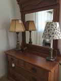        Antique dresser and two of many lamps