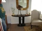 One of pair of Queen Anne wing chairs, replicas of 18th century American period chairs, art deco console table