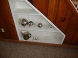 Silver plate three piece tea set and sort of leopard print pitcher