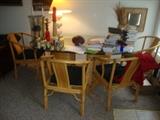 rattan and glass dining table in really good shape