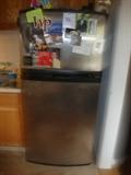 Stainless steel refrigerator, good condition, owner made mostly reservations for dinner so he didn't cook a lot. 