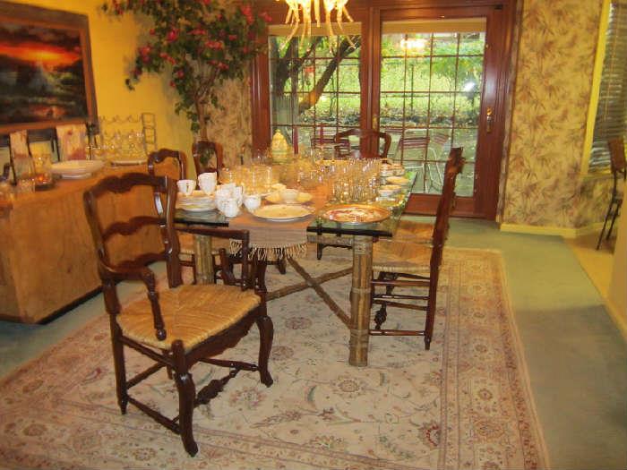 Stunning vintage Greenbaum glass top DR table with bamboo base Six Country French chairs Pictures does not do this set justice. It is beautiful!