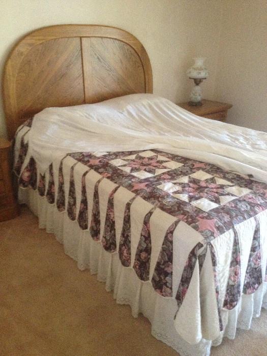 oak bedroom set and antique quilt