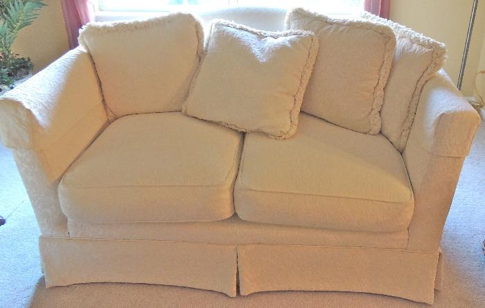 Loveseat in off-white jacquard upholstery (has matching sofa, photo to follow). Excellent condition,  clean, moderately firm and very comfortable seating.