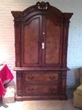 Beautiful clothes/television cabinet. Also has 2 draws at bottom for clothes or whatever you choose.