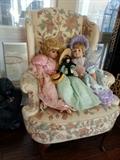 Chairs and dolls