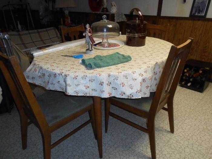 mid century table with 6 chairs