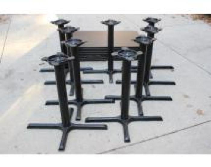 Restaurant quality tables. 9 restaurant quality tables with cast metal bases. These are in good condition. The tops measure 48"x30" Perfect for your restaurant or even extra quests this holiday season.