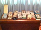 vintage baby shoes, most with boxes