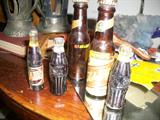Coca Cola lighters and bottles