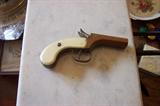 black powder pistol mother of pearl grips